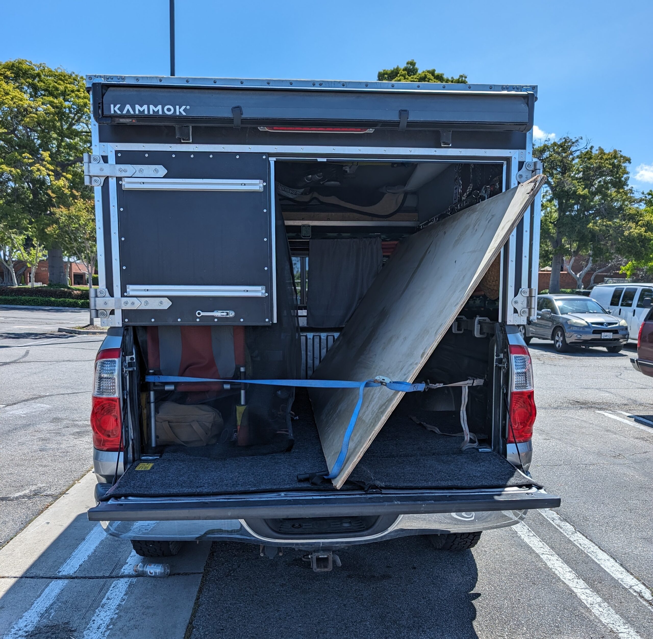 photo of camper hauling wood